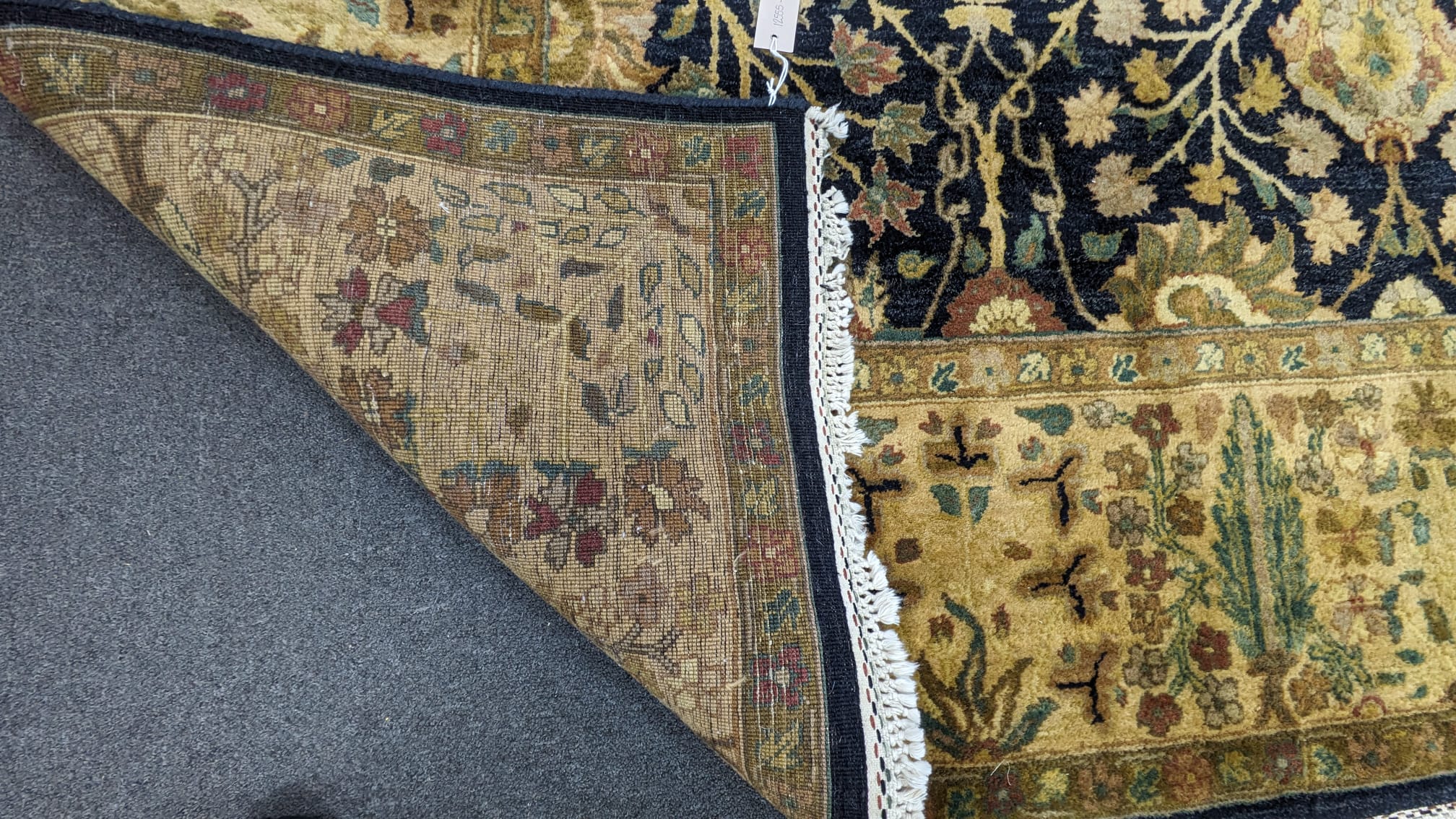 A fine Lahore blue ground carpet, 300 x 246cm